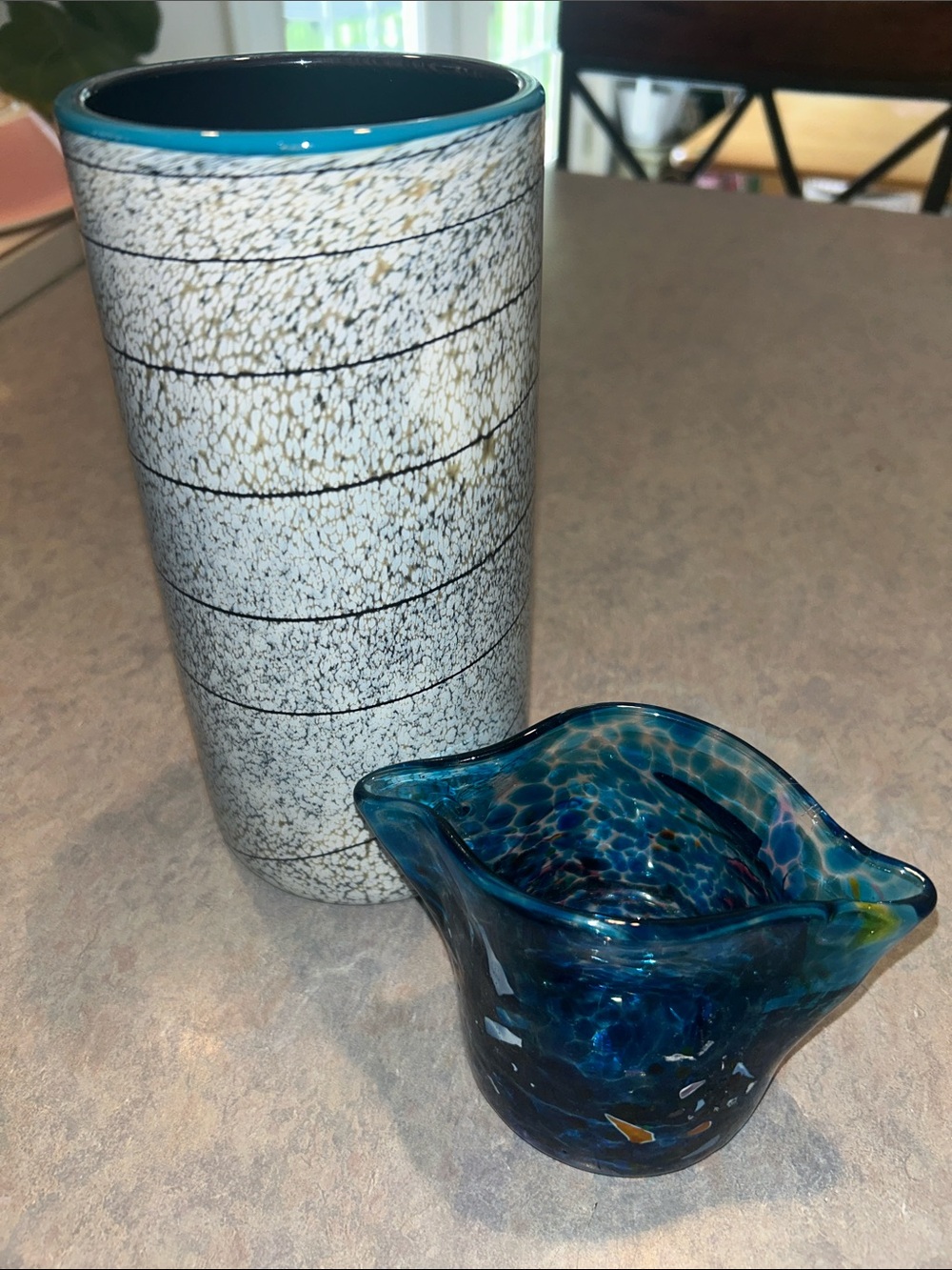 Two hand blown collectors item vases